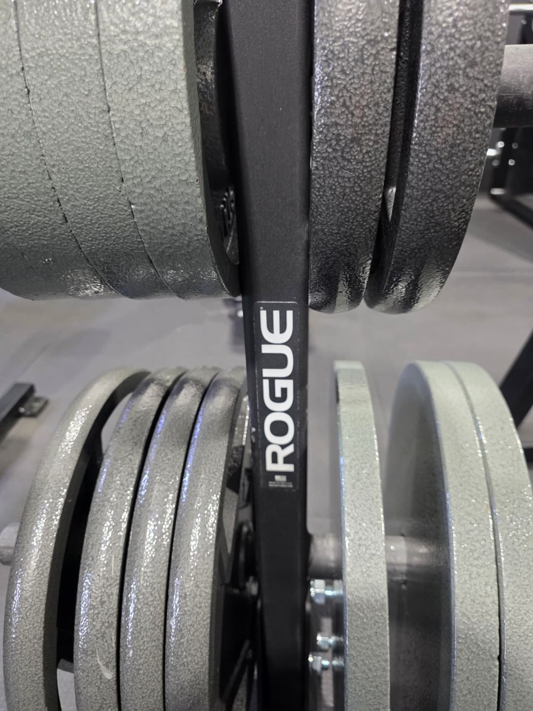 Rogue barbell loaded with plates